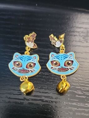 K Pop Demin Hunter Derpy Tiger Dangle Earrings with Gold Bells